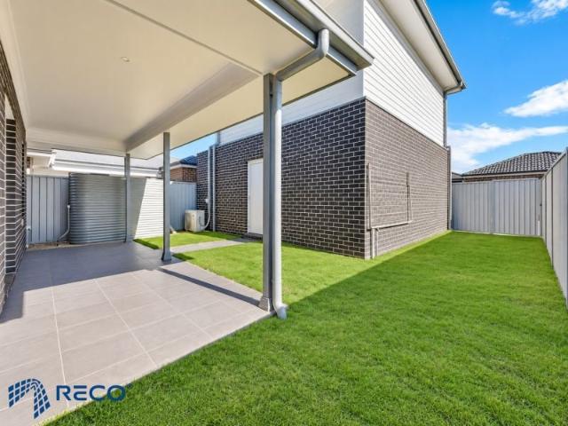 This home offers generous, low maintenance living, ideal for families or professionals. Featuring a contemporary open plan design, it comprises three spacious bedrooms, including a master suite, two modern bathrooms, and light filled living and dining are
