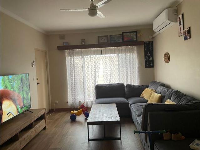 This lovely unit is ideally situated in a small single level group of 3