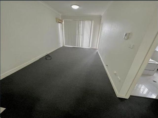 This secure two bedroom unit is in excellent location