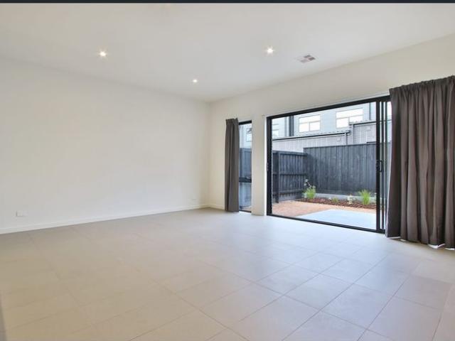 This town home is perfectly situated in the Tullamore Estate