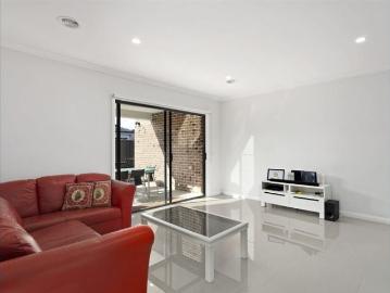 This townhouse offers style & low maintenance living