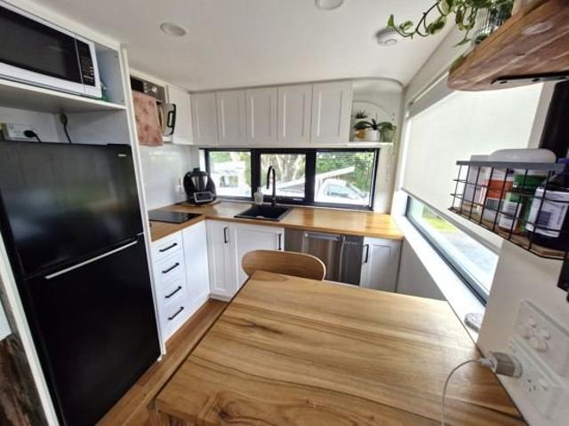 This 2 Storey Tiny Home is packed with features!