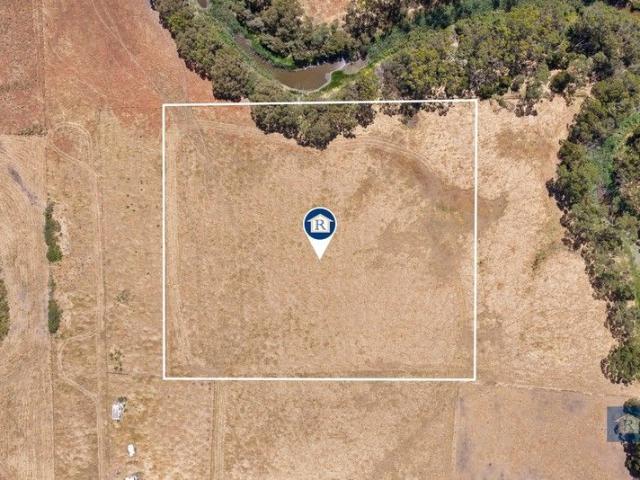 Three Acres of Quiet Country Opportunity.