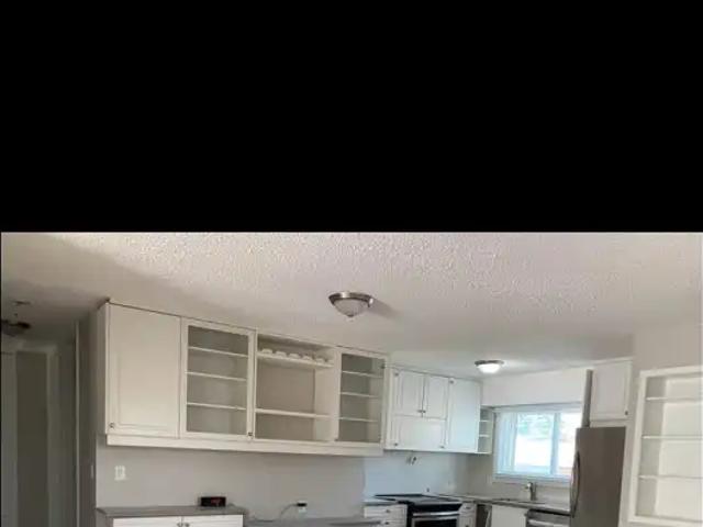 Three bedroom one and a half bath upper floor suite