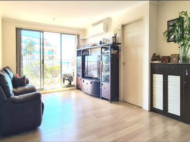 THREE BEDROOM APARTMENT LOCATED IN HIGH RISE BUILDING