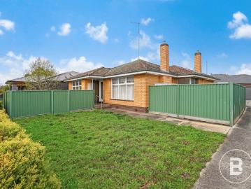 THREE BEDROOM BRICK HOME IN CONVENIENT LOCALE