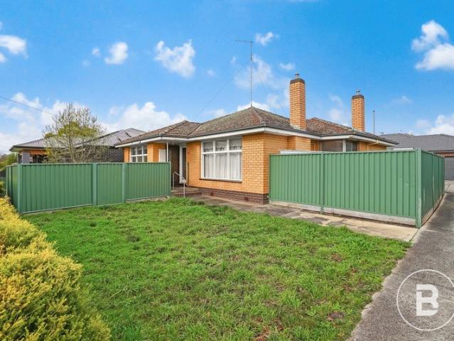 THREE BEDROOM BRICK HOME IN CONVENIENT LOCALE
