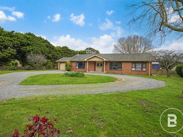 THREE BEDROOM BRICK VENEER ON OVER 2 ACRES WITH SHEDDING