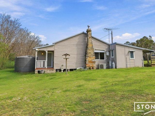 THREE BEDROOM COTTAGE ON APPROXIMATELY 27 ACRES