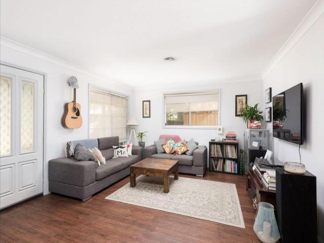 Three bedroom duplex with sunny yard