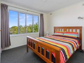 Three Bedroom Home | BIRs | Air Conditioning | Balcony | Organic Garden | Fully Fenced Block