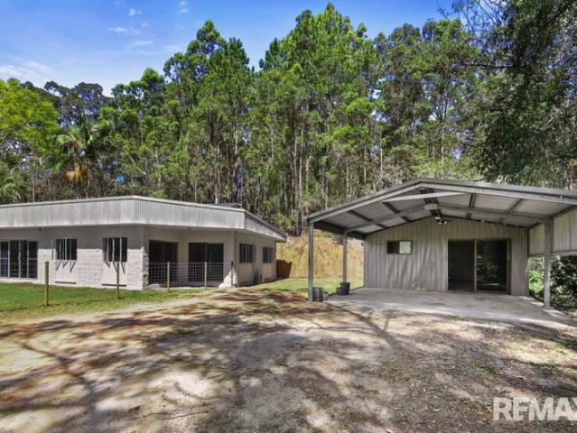 Three bedroom home with 14 x 7m powered shed in serene hinterland location Includes Electricity