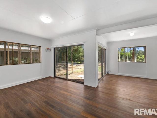 Three bedroom home with 14 x 7m powered shed in serene hinterland location Includes Electricity
