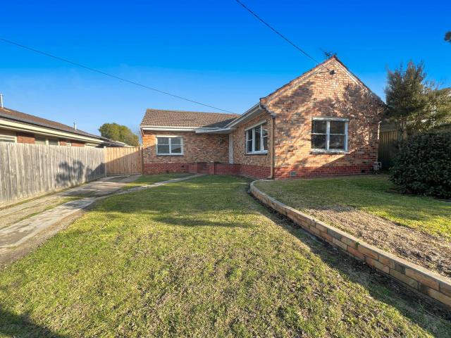 Three bedroom home with a generous backyard