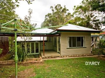 Three Bedroom Home with A Huge Yard & Leafy Outlook