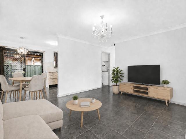 THREE BEDROOM HOME WITH FULLY FENCED YARD