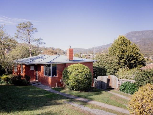 Three bedroom home with generous block, scope to improve and 15 minutes from the Hobart CBD