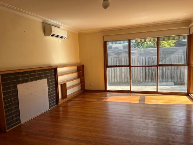 THREE BEDROOM HOME WITH LARGE YARD AND GARAGE