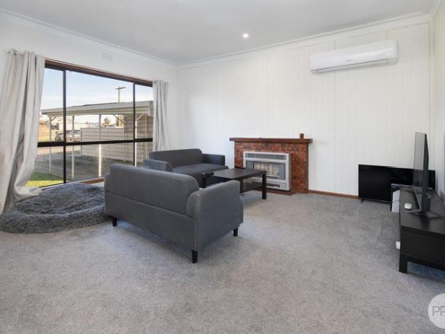 THREE BEDROOM HOME WITH LARGE REAR YARD