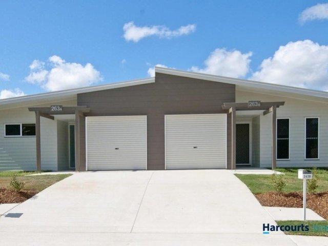Three Bedroom Home with Modern Amenities and Private Courtyard
