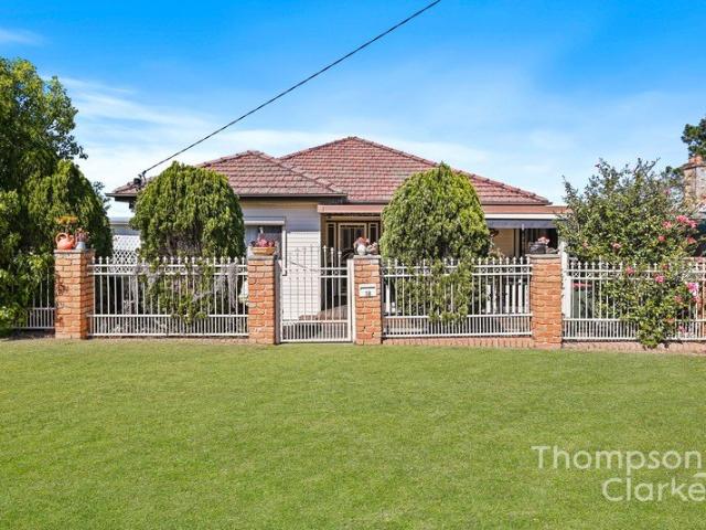 Three Bedroom Home with Renovated Kitchen + Covered Deck