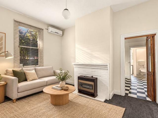 Three Bedroom Home with Rear Courtyard and Storage