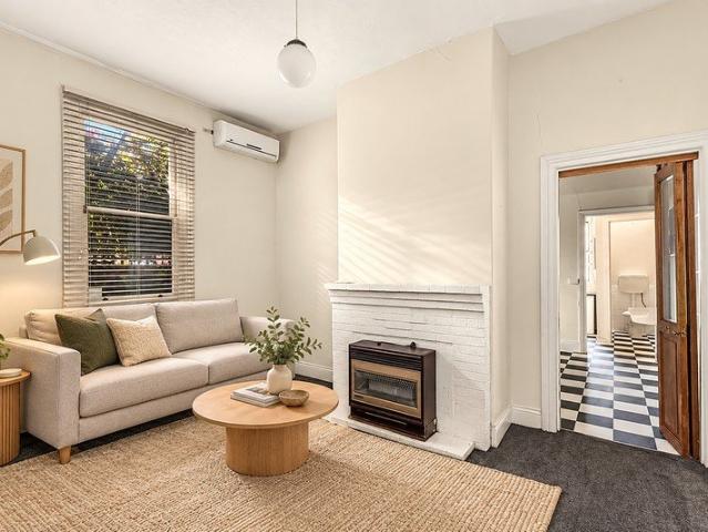 Three Bedroom Home with Rear Courtyard and Storage