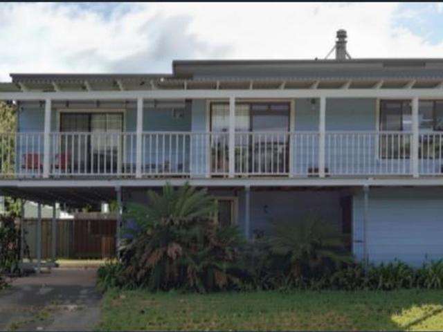 Three bedroom home with single carport