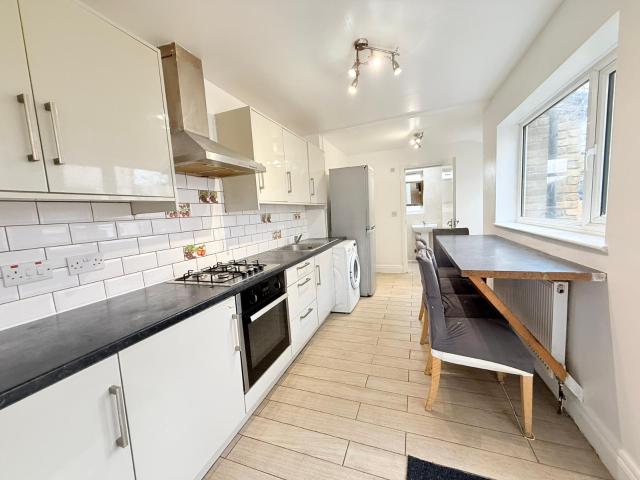 Three bedroom house close to King Georges Hospital £2300