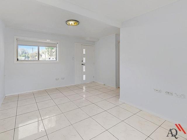 THREE BEDROOM HOUSE WITH SPACIOUS BACKYARD
