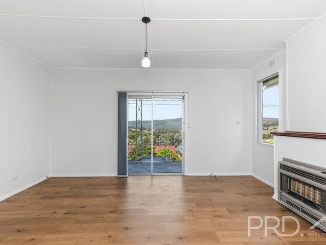 THREE BEDROOM RENOVATED HOME WITH VIEWS OVER THE ROLLING HILLS OF BATLOW