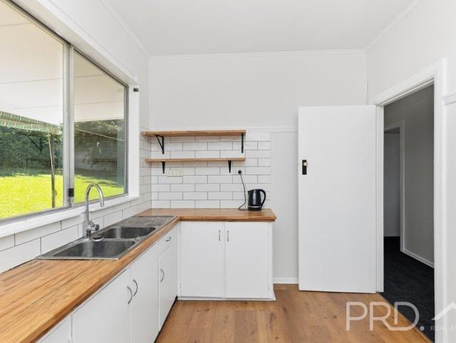 THREE BEDROOM RENOVATED HOME WITH VIEWS OVER THE ROLLING HILLS OF BATLOW