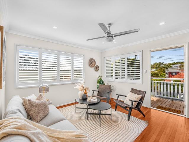 Three bedroom two bath house in one of Taringa's most desirable street