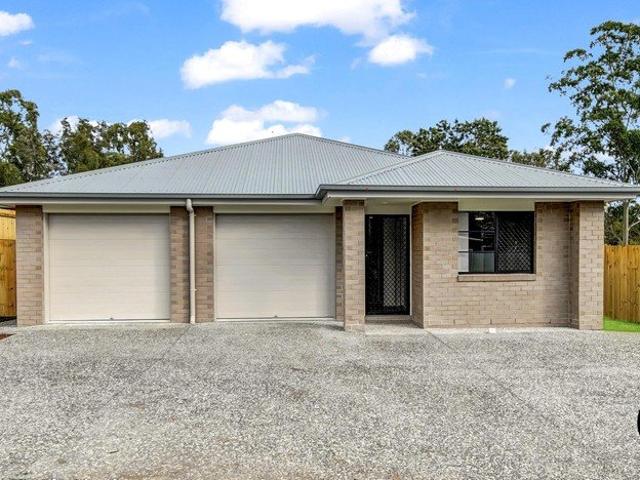 Three Bedroom, Two Bathroom, Fully Fenced Duplex with extra parking