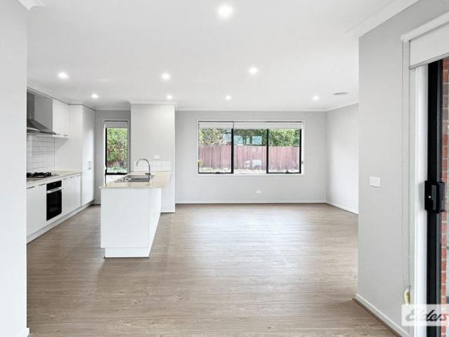 THREE BEDROOM TWO BATHROOMS