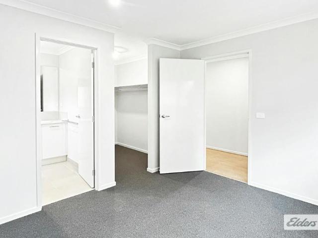 THREE BEDROOM TWO BATHROOMS