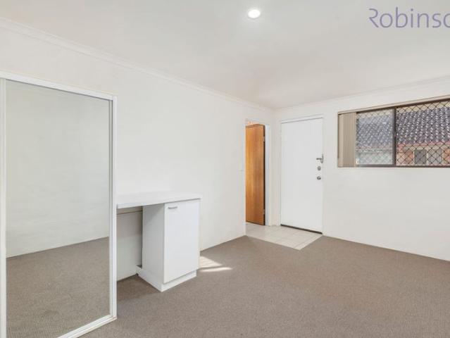 Three bedroom townhouse with parking for two vehicles