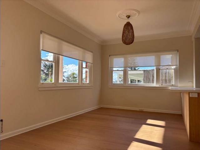 Three bedroom with balcony — freshly painted, timber floors, new kitchen