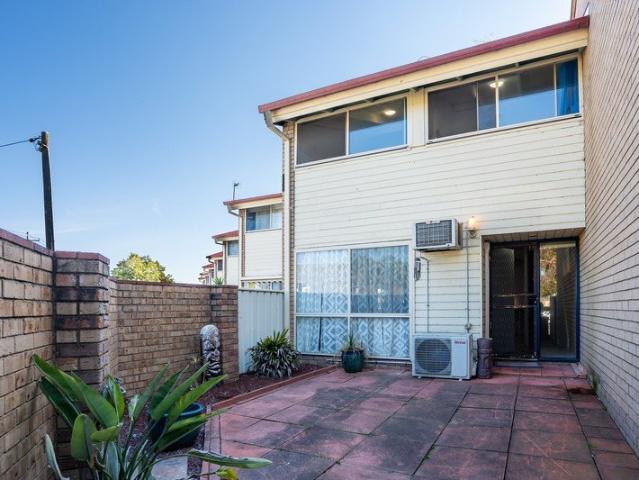 Three Bedrooms, Two Levels & Room to Improve!