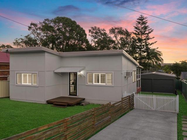 Three bedrooms with side access to shed