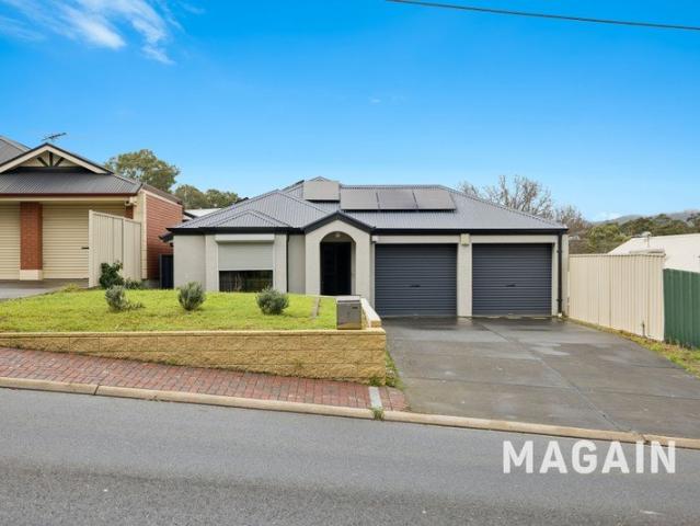 Three Bedrooms, Double Garage And A Deck With Views