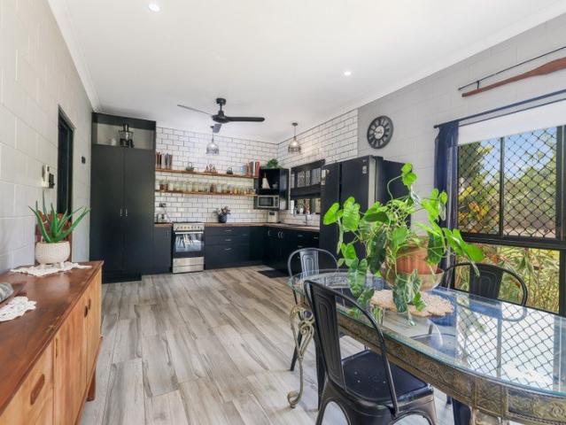 Three Dwellings, Five Acres and Outstanding Income Potential