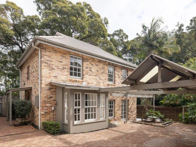 Three level family home in private park side position