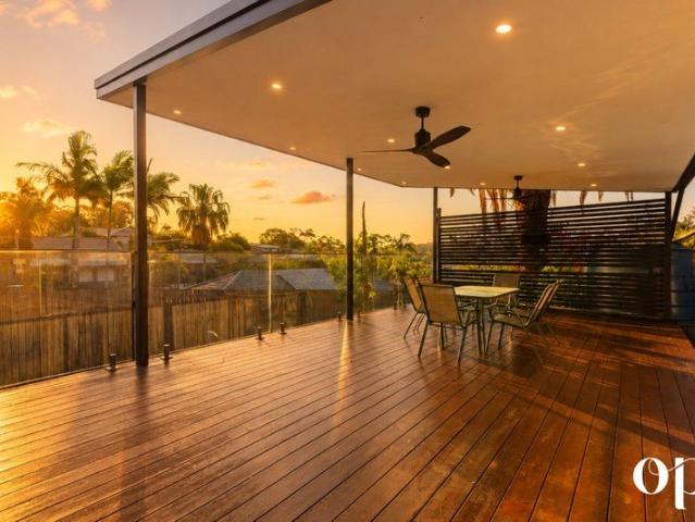 Three Levels of Luxury with Grand Entertaining, Sunset Views and Two Master Suites