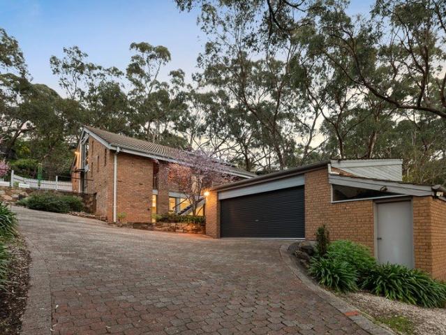 Three Levels of Storybook Living Wrapped in Belair Beauty