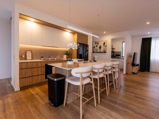 THREE LEVELS. PREMIUM FINISHES. WATERFRONT LIVING