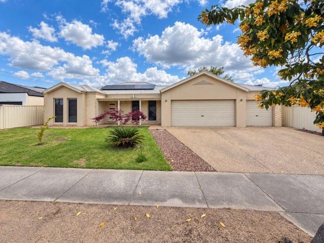 Three living areas, a triple garage and an Arthur Park address
