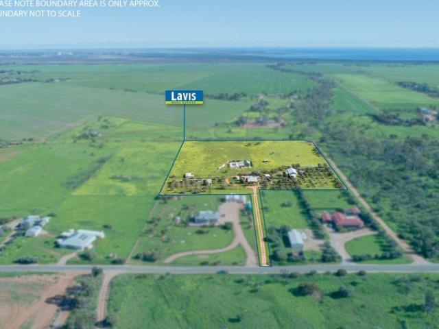Three Street frontage and over 14.9 acres of land