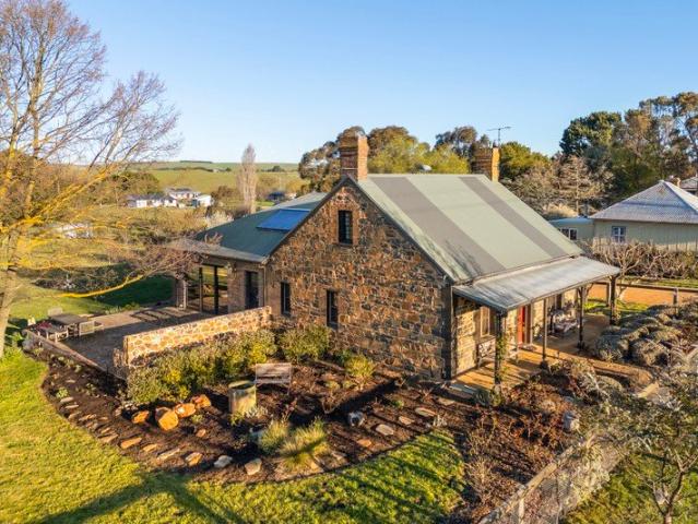 Timeless 1878 bluestone masterpiece with barn & studio