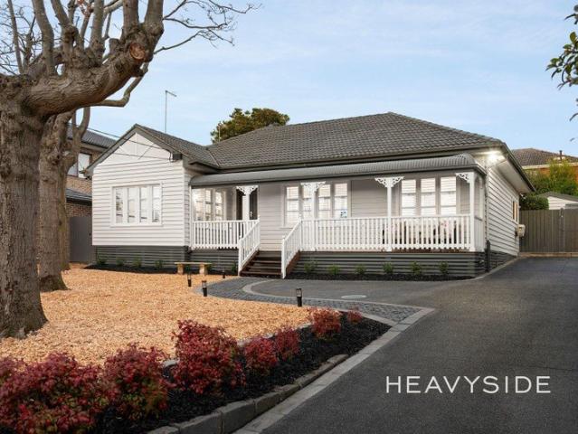 Timeless 1952 Family Home | Fully Renovated | High side of the Street